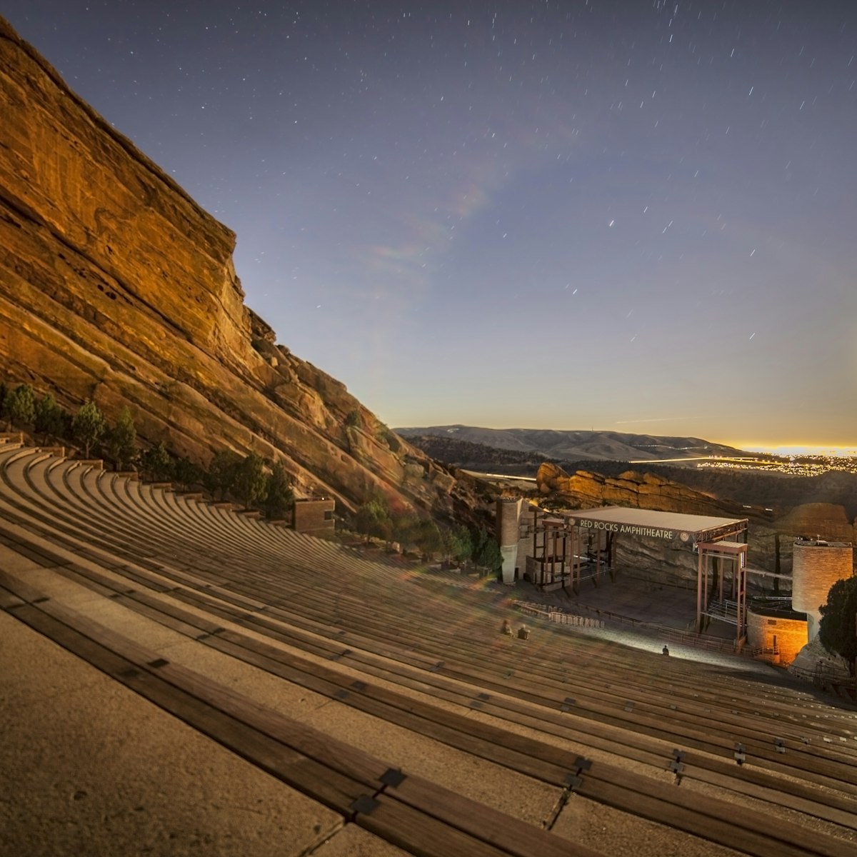Denver's Red Rocks venue in the foreground, exploits the full moon as the main event.