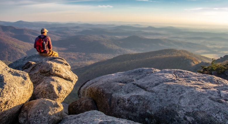 Man enjoying sunrise on Old Rag Mountain in Shenandoah National Park, License Type: media, Download Time: 2024-09-11T02:53:38.000Z, User: meg3348277, Editorial: false, purchase_order: 56530, job: Global Publishing-WIP, client: New York & the Mid-Atlantic 3, other: Megan Cassidy